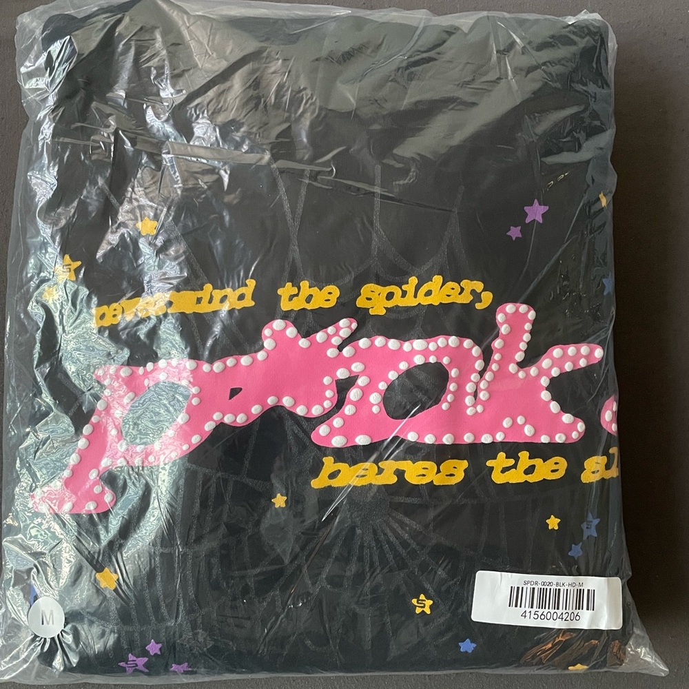 Black Hoodie with Pink Graphic and Star Accents